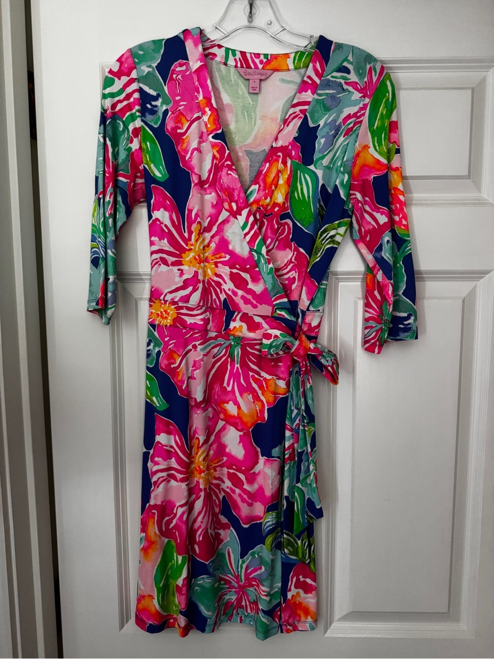 Lilly Pulitzer Neon Pink Floral Wrap Mini Dress with bright colorful pattern